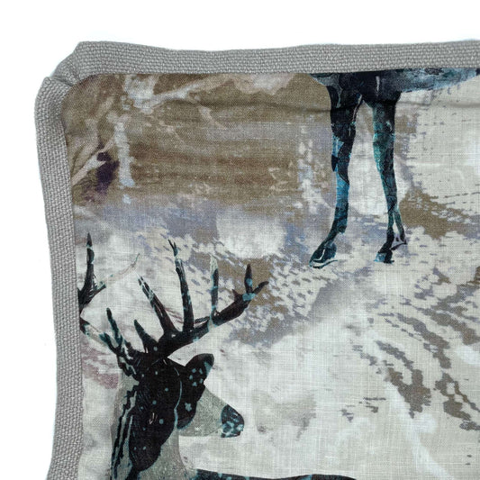 Textile with deer design on a neutral background