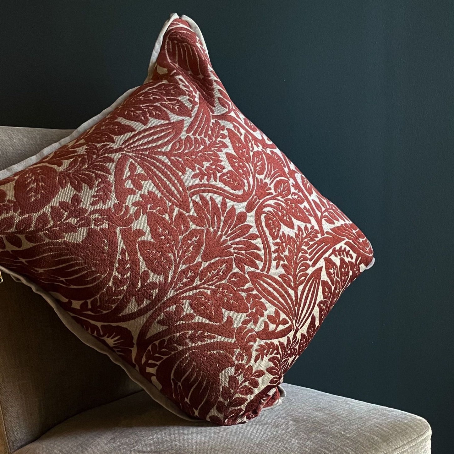 Chenille rust colour velvet in with foliage motifs on plain stone colour linen fabric, with plain stone colour backing 60cm x 60cm