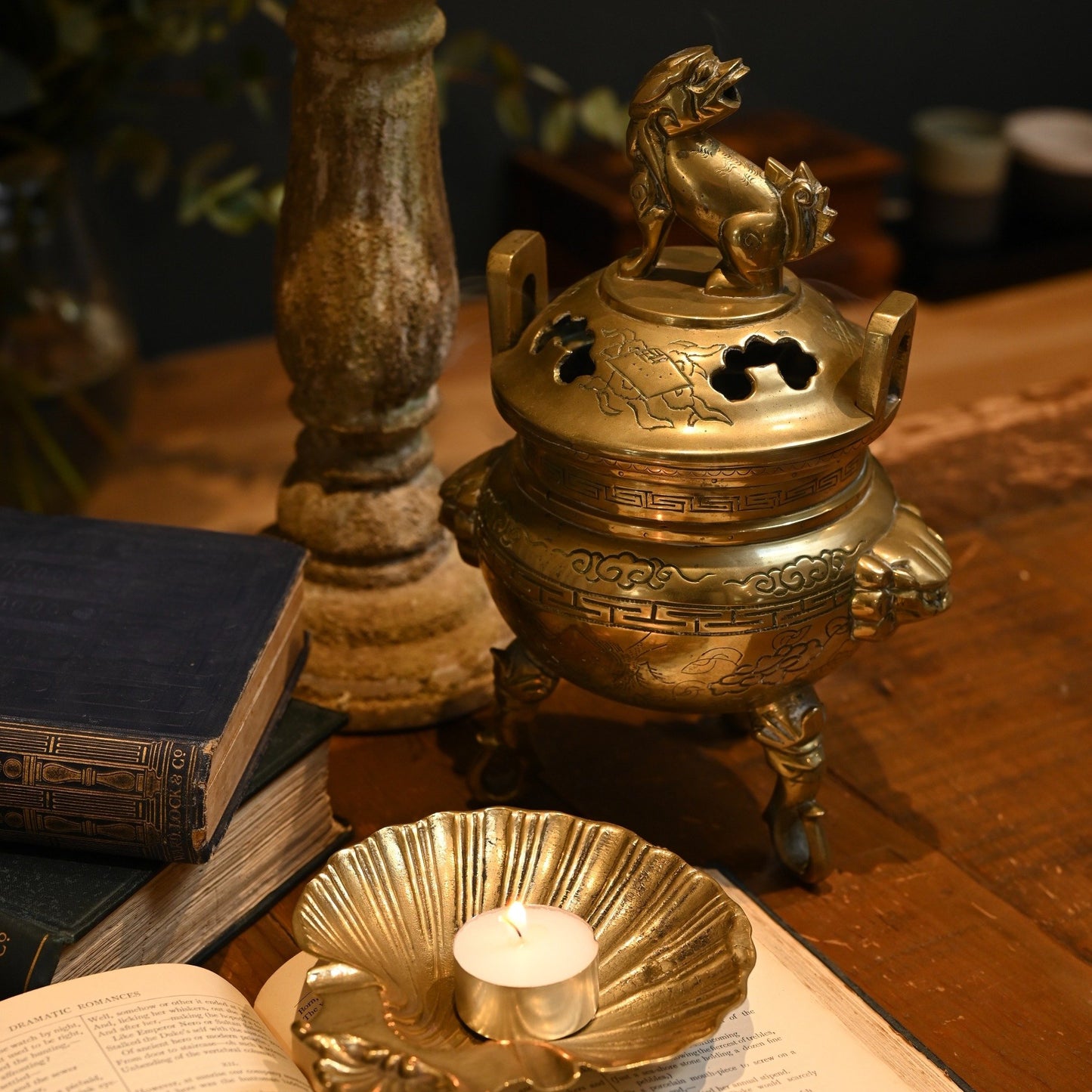 This solid brass Chinese incense burner, topped with a foo dog symbolizes protection and guardian spirit energy. Cira 1950's.