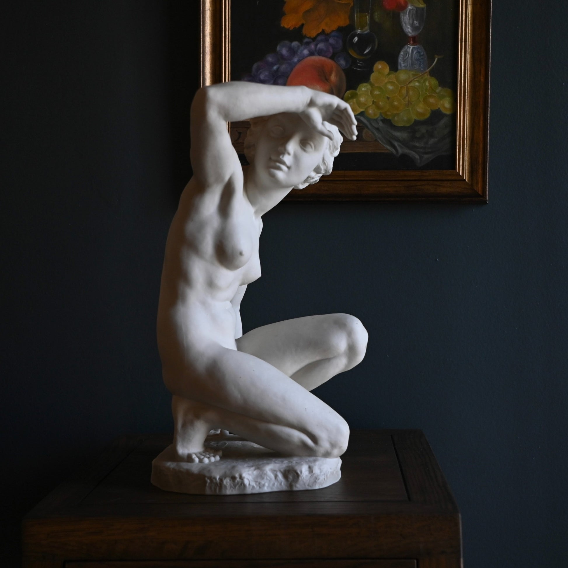 Elegant mid-century Hutschenreuther porcelain figurine by Carl Werner in Blanc de Chine, capturing serene introspection with timeless sculptural grace.