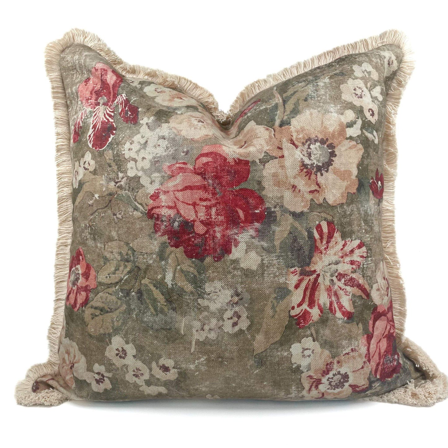 Floral patterned pillow with red and beige flowers on a white background