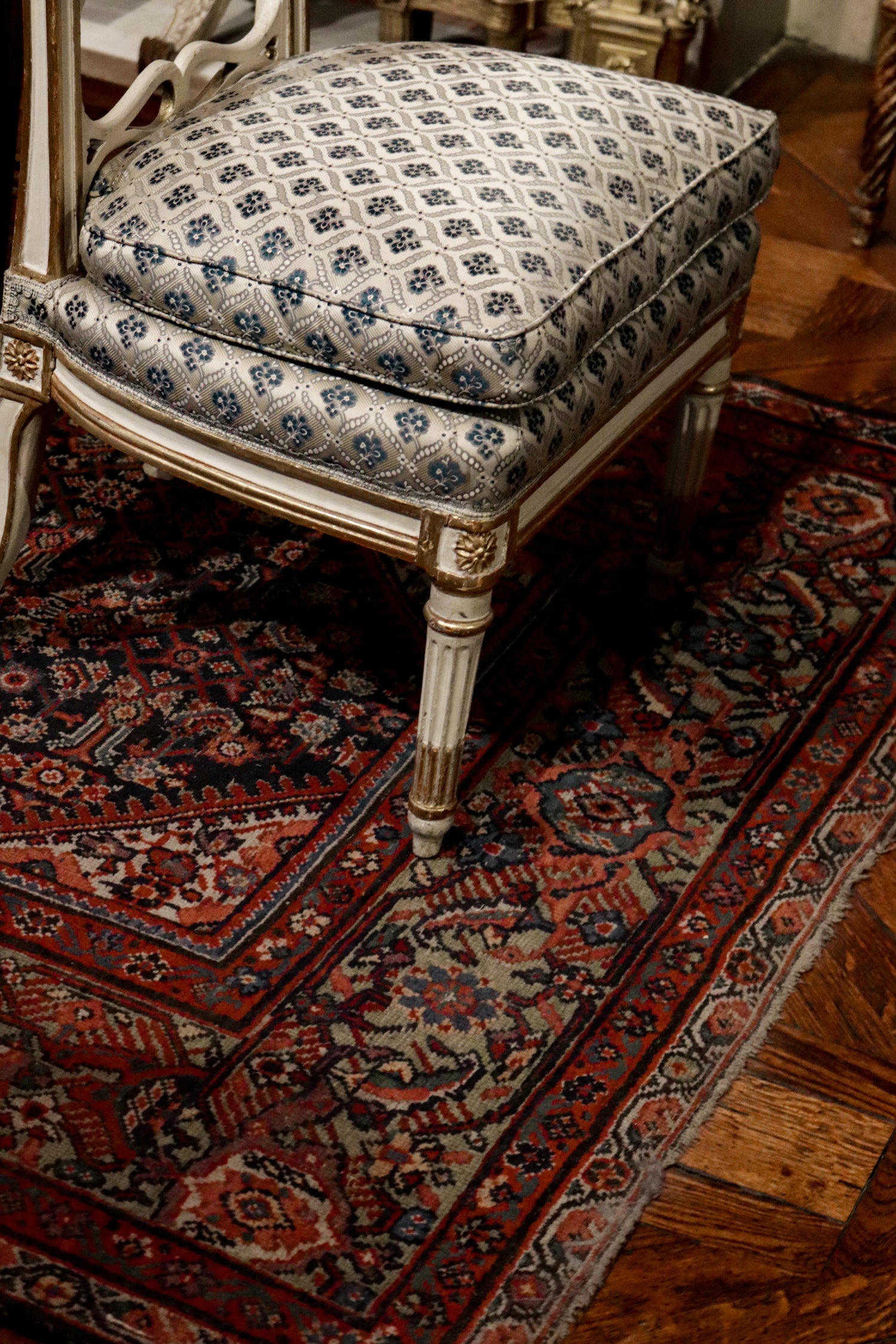 Antique and vintage rugs with soft furnishings, scatter cushions and throws