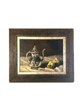 Framed still life painting with a silver teapot and pears on a white surface.