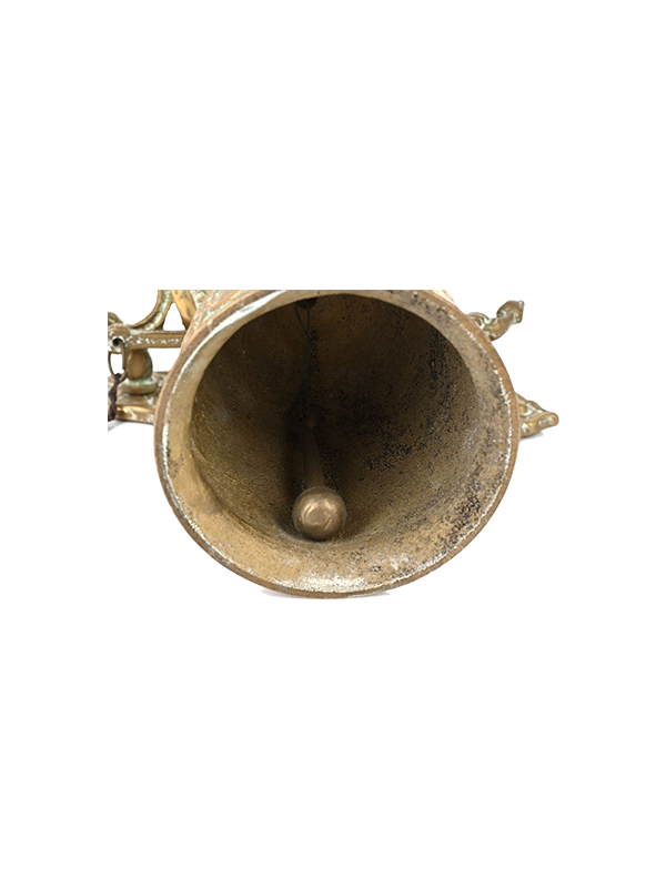 Antique brass bell on a white background