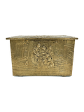 Antique brass decorative storage or firewood box with intricate carvings on a white background