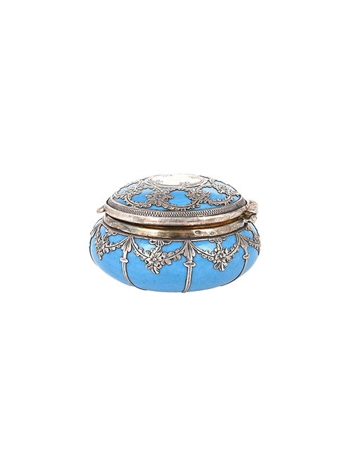 Decorative antique silver blue trinket box with silver embellishments on a white background