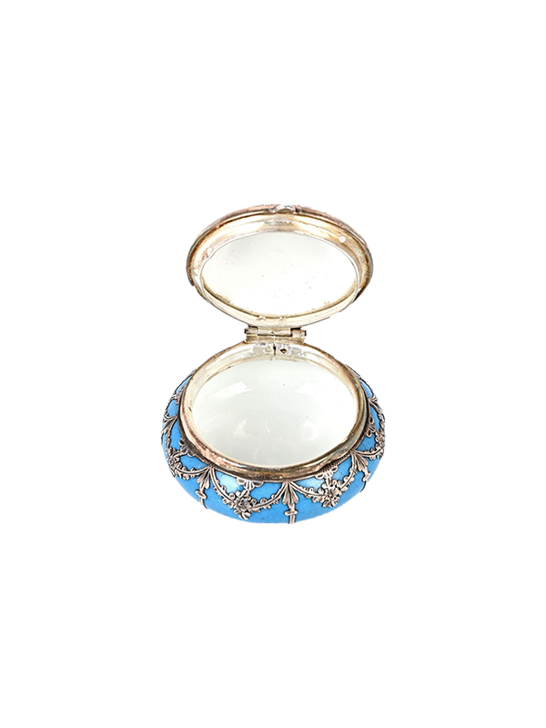 Decorative trinket box in turquoise & silver and a white interior on a white background
