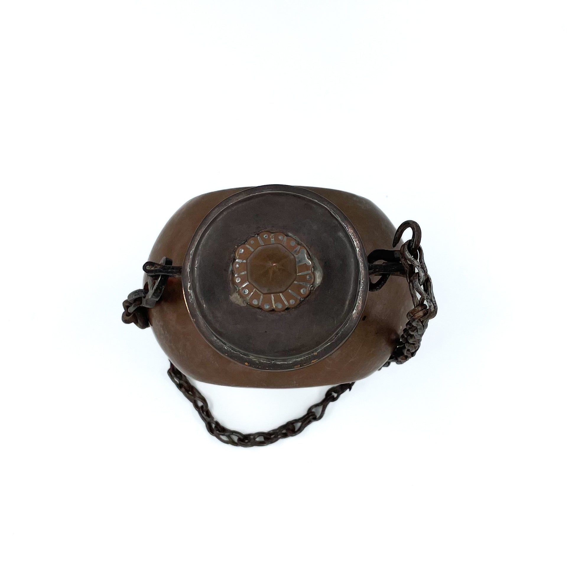 Top view of an antique copper water canteen dating back to the early 19th century 