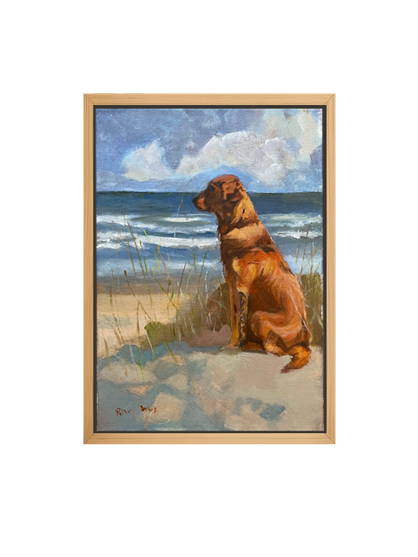 Framed oil artwork of a dog sitting on a beach with ocean and sky in the background.