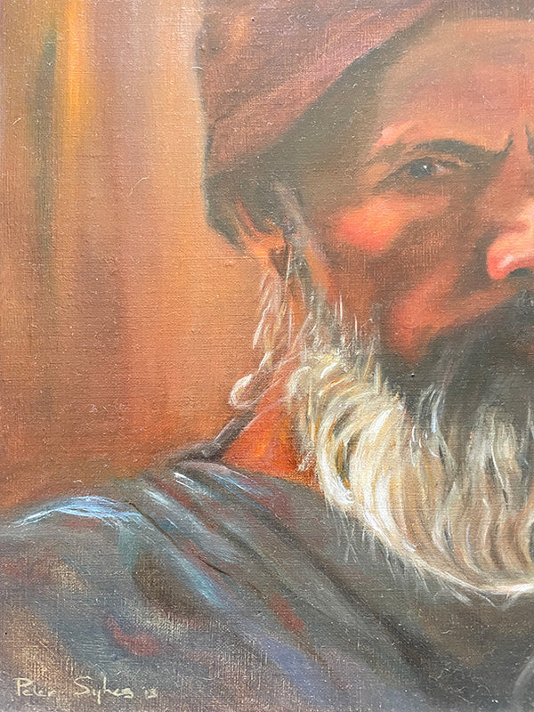 Close-up of an oil portrait painting of a bearded man with a hat, signed and dated