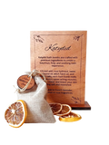Katydid bath bomb packaging with wooden box and dried orange slices on a white background