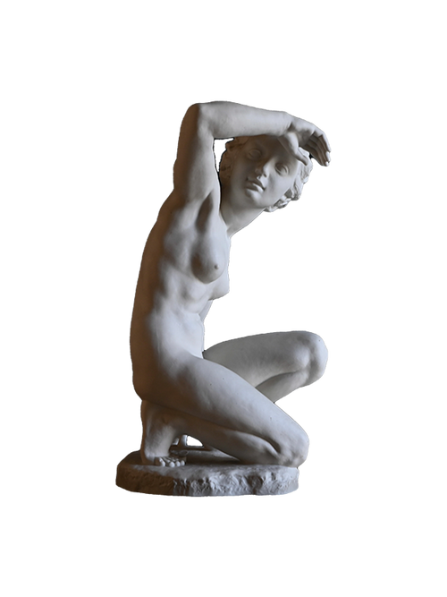 White blanc de Chine porcelain statue of a nude figure on a white background