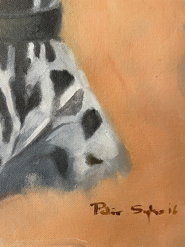Close-up of a dalmatian dog oil painting with a signature at the bottom right corner.