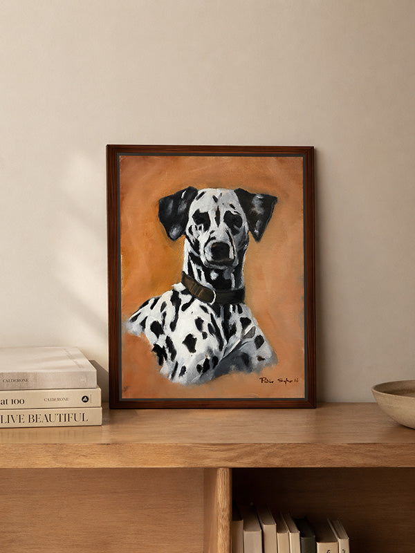 Framed painting of a Dalmatian dog on a wooden shelf with books and a bowl.