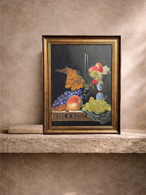 Framed still life painting with fruits and flowers on a stone ledge.