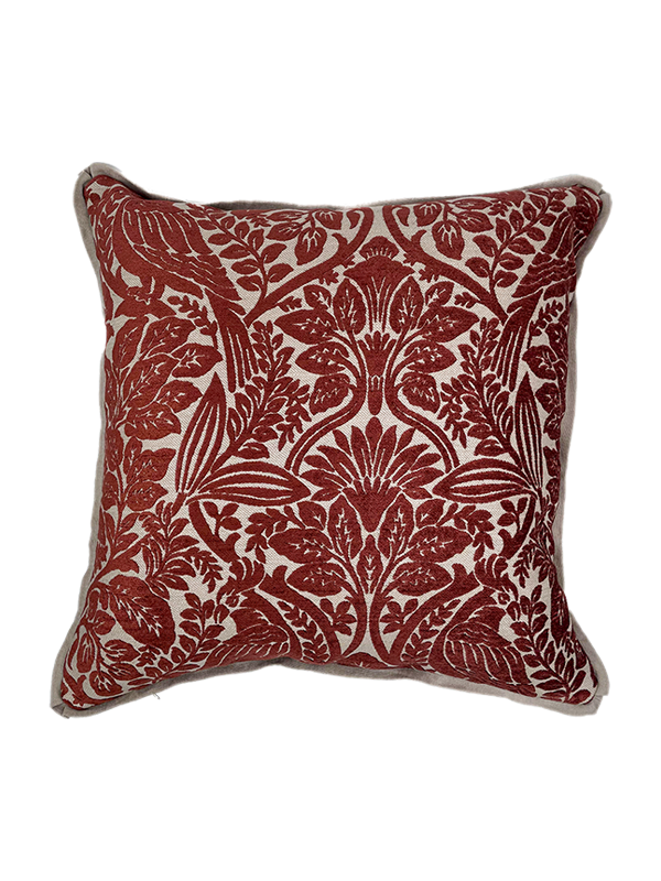 Red floral velvet patterned pillow on a white background