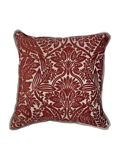 Red floral velvet patterned pillow on a white background