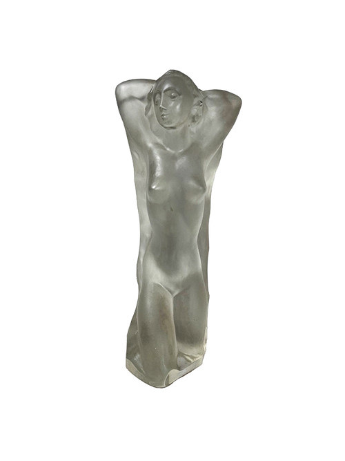 Frosted glass sculpture of a female figure on a white background