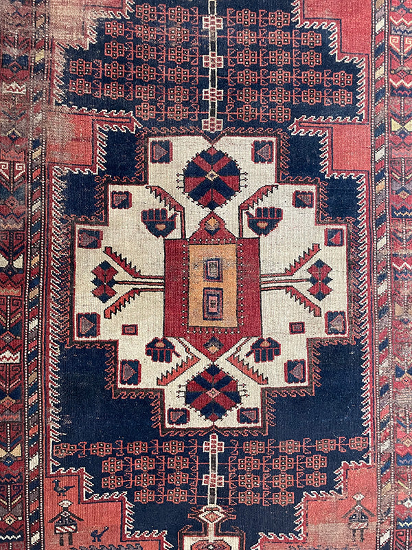 Close-up of a patterned rug with geometric design