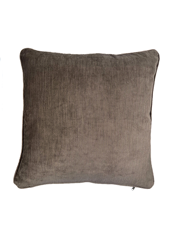Brown textured velvet pillow on a white background