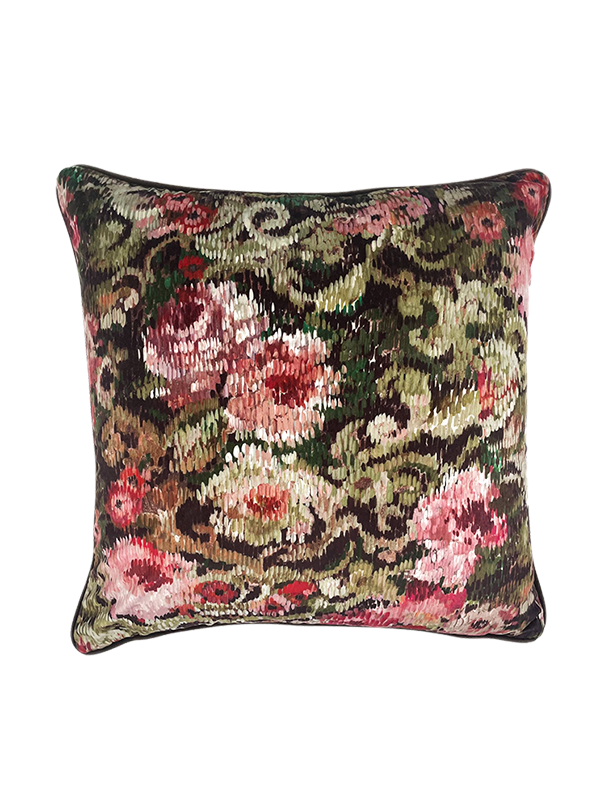 Floral velvet patterned decorative cushion  on a white background