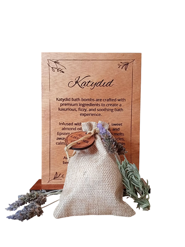 Katydid bath bomb packaging with lavender and wooden label on a white background