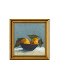 Framed painting of a still life with oranges and a bowl on a textured surface.