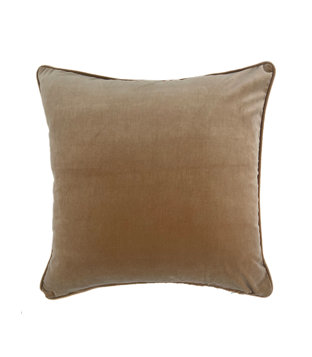 Brown velvet pillow on a white background