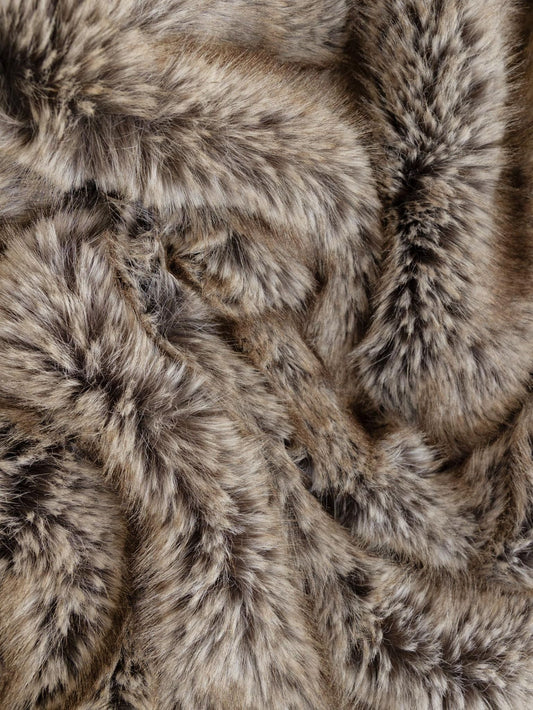 Wrap yourself in the refined warmth of this throw. In a soft ash mink tone, this richly textured piece brings a sense of comfort and luxury to your space