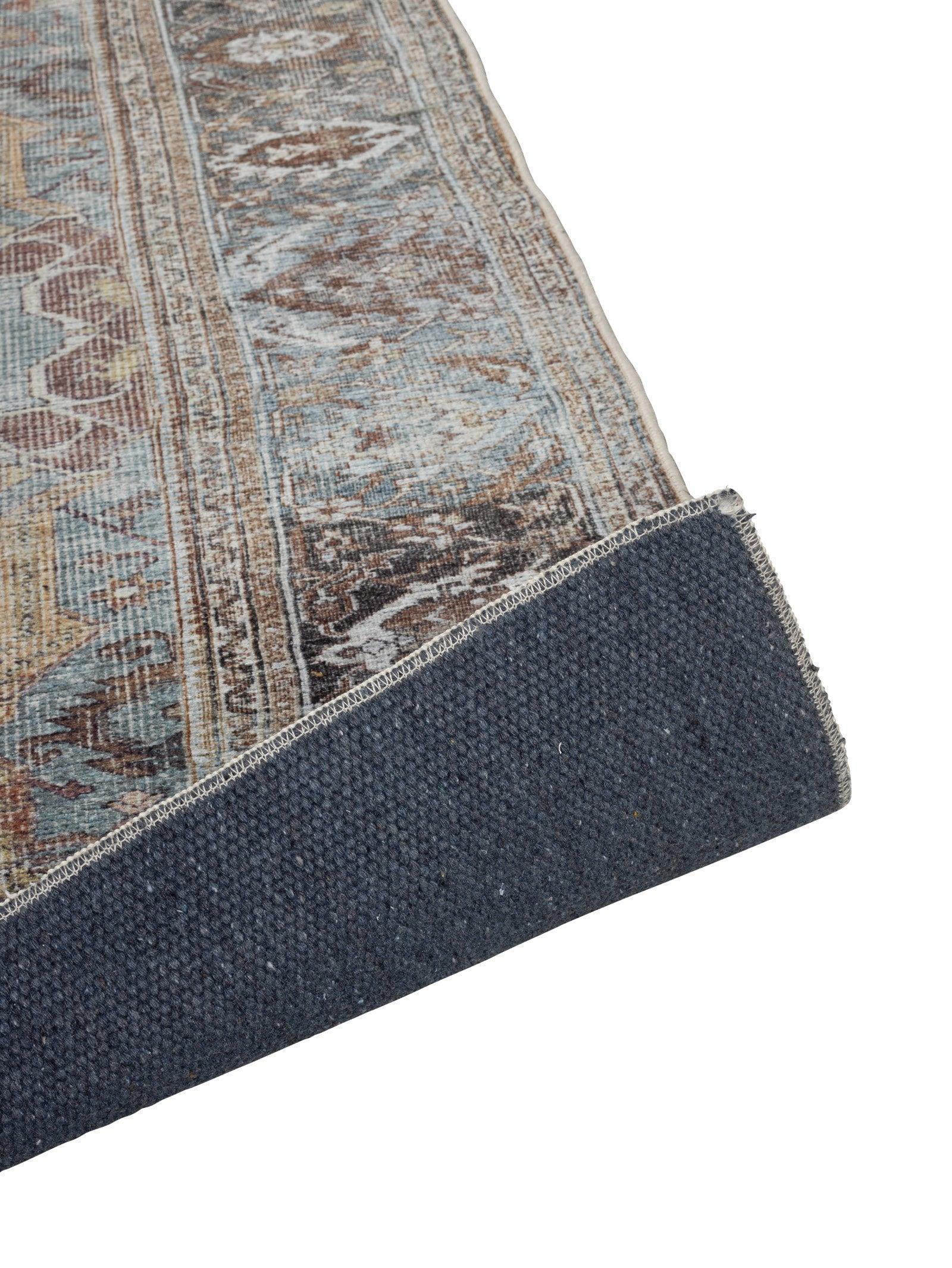 Step into quiet opulence, where aged indigo, faded rust and antique gold weave a story of heritage and grandeur.