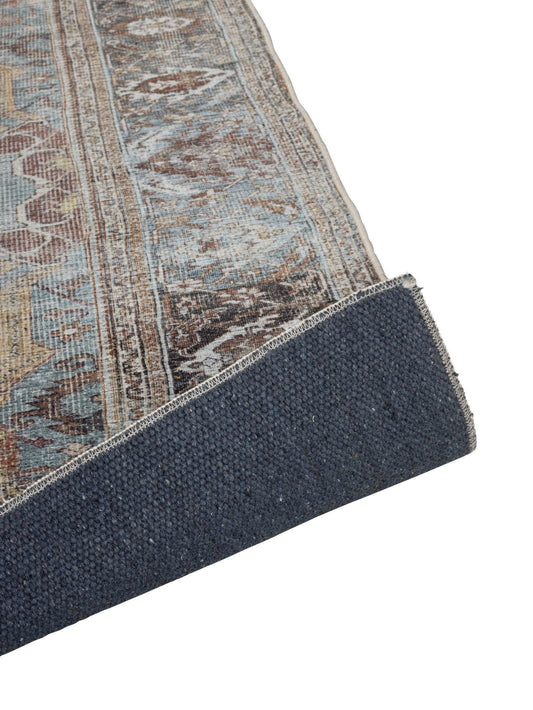 Step into quiet opulence, where aged indigo, faded rust and antique gold weave a story of heritage and grandeur.