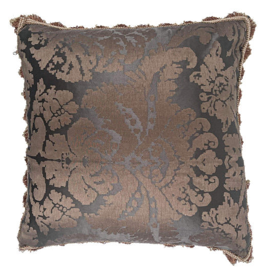 Decorative pillow with floral pattern on a white background