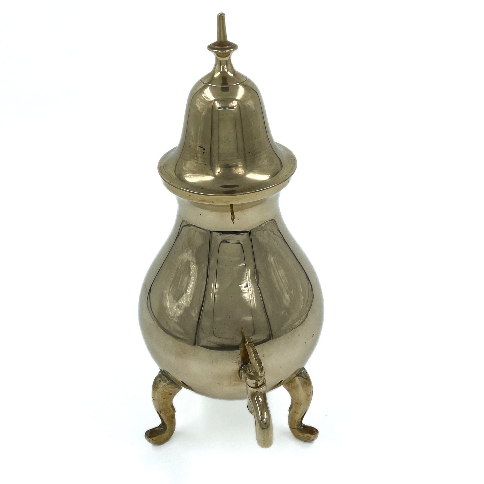 A vintage brass Samovar viewed from the front