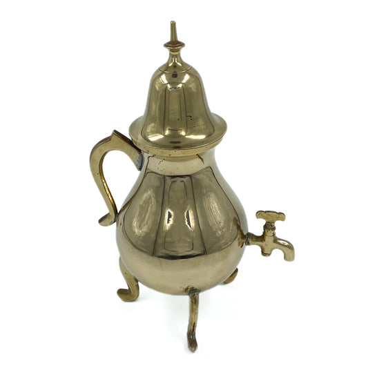 A vintage brass Samovar side view