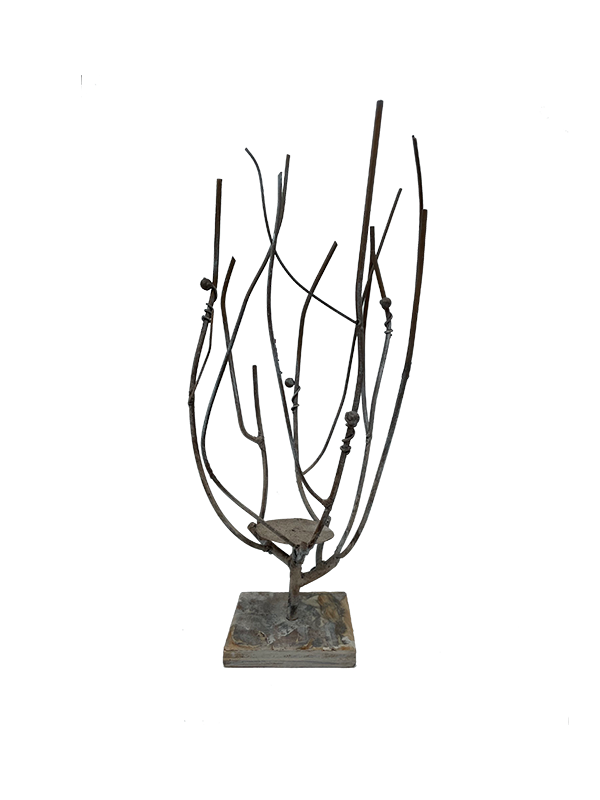 Decorative metal branch sculpture on a square base against a white background